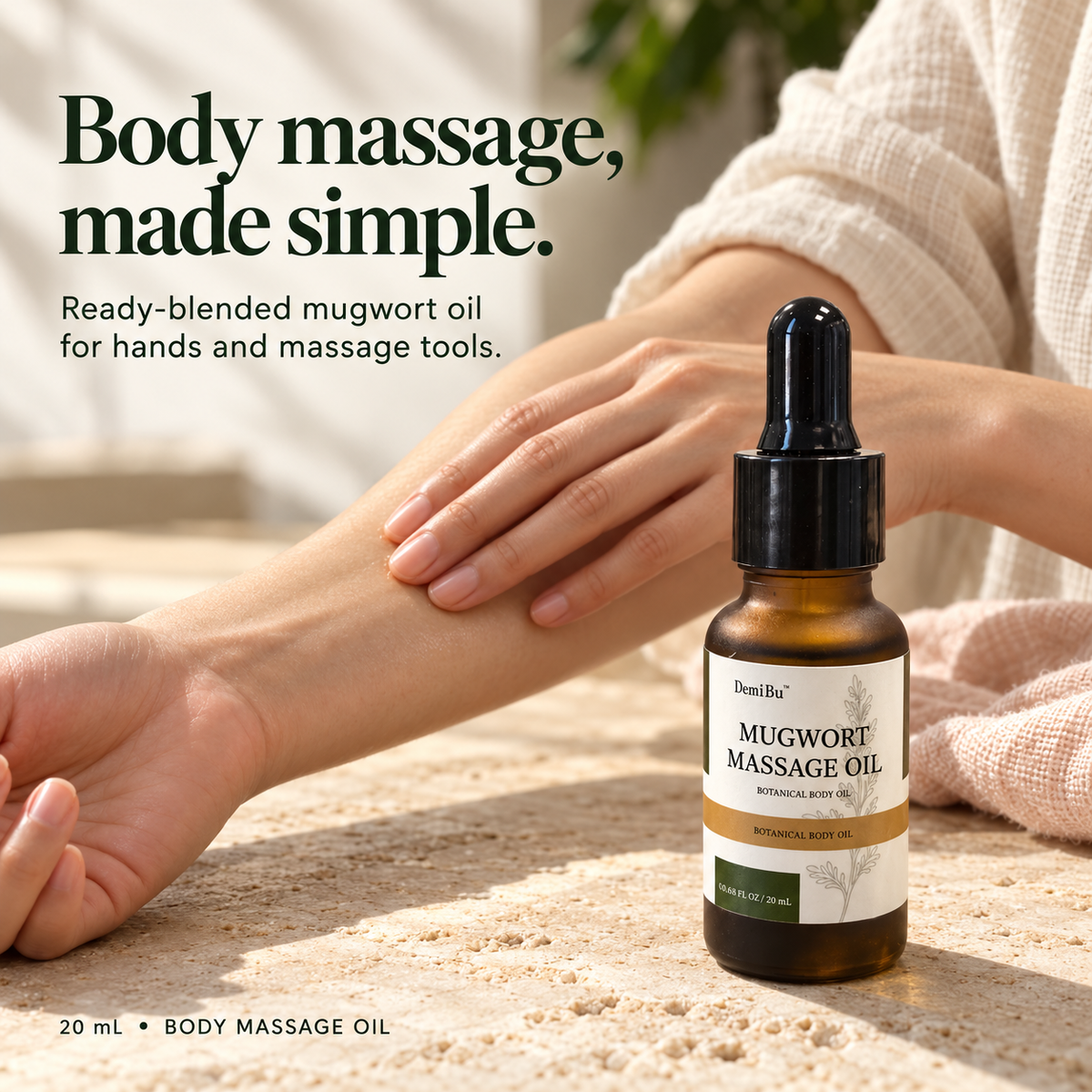 DemiBu Mugwort Massage Oil bottle in the foreground as hands massage a forearm.