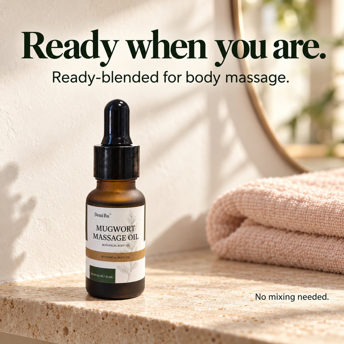 DemiBu Mugwort Massage Oil on a cream shelf beside a folded blush towel, with a ready-blended message.